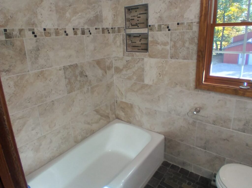 Construction industry tile work bathrooms, showers, flooring and backsplashes in East Springfield Ohio